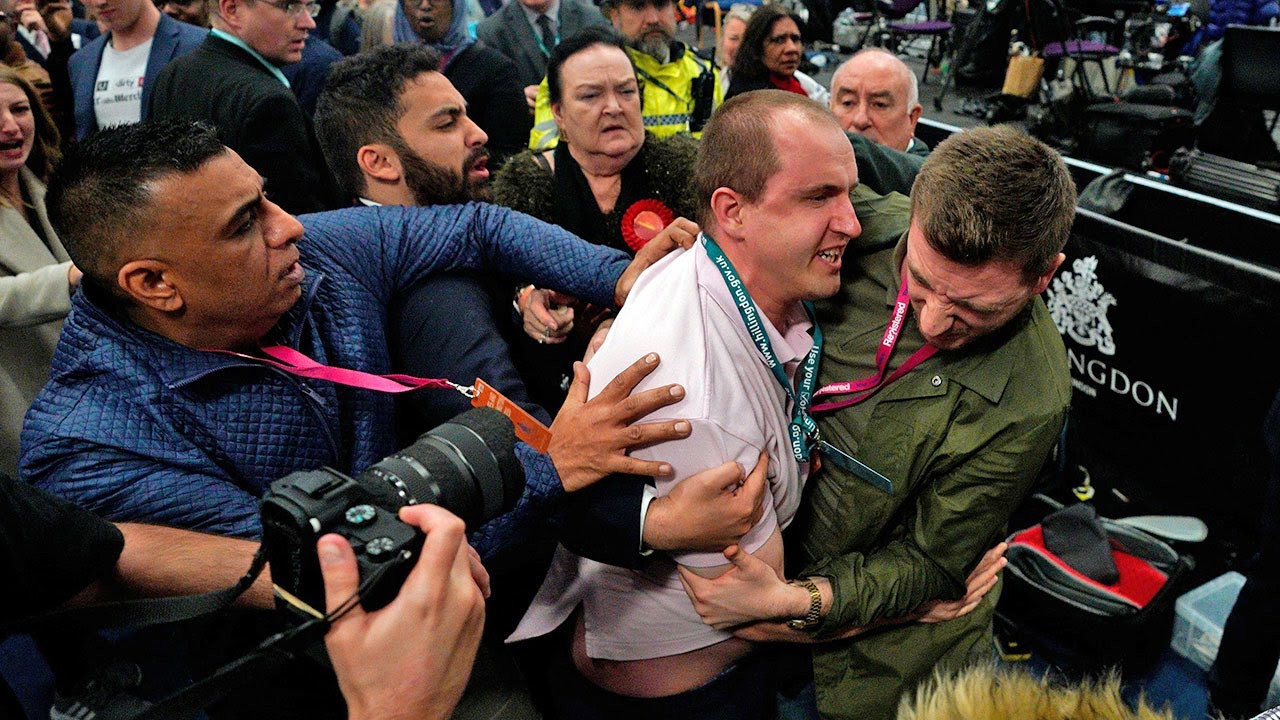 Fight breaks out during John McDonnell's speech after he is heckled by crowd