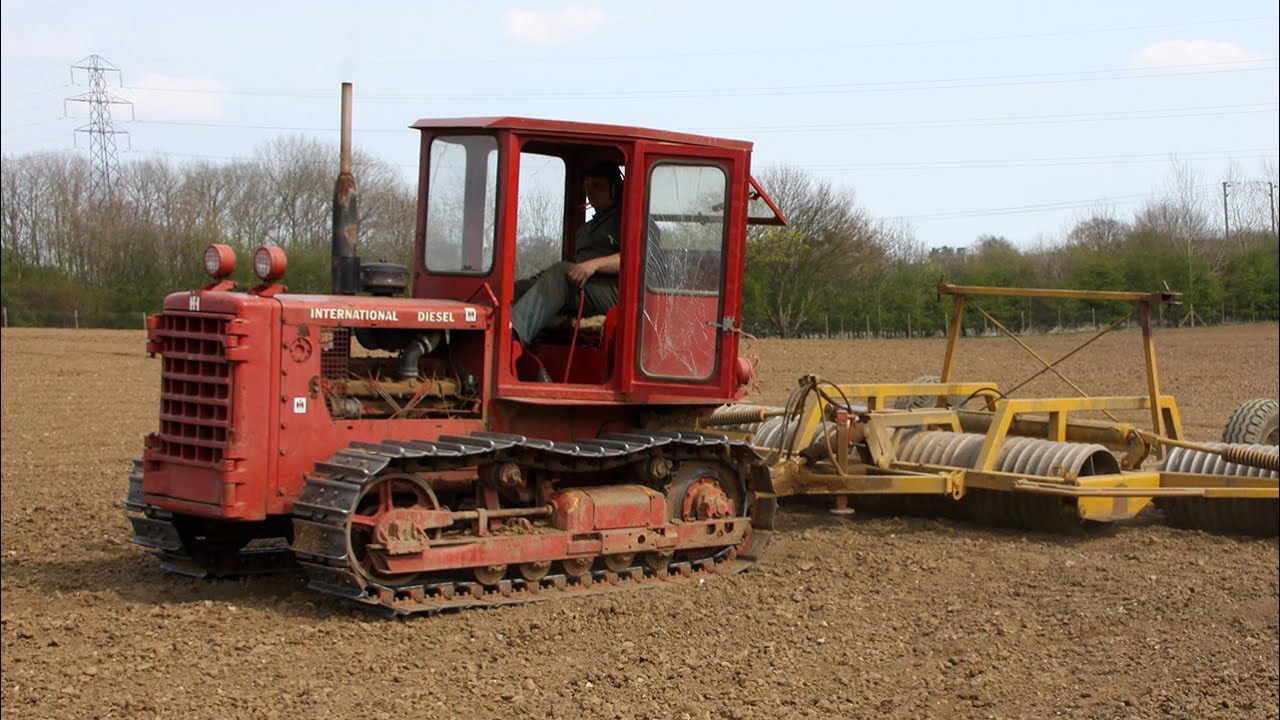 Rolling in sugar beet with a re-powered International (IH) TD-8 crawler and a 9m Needham rolls