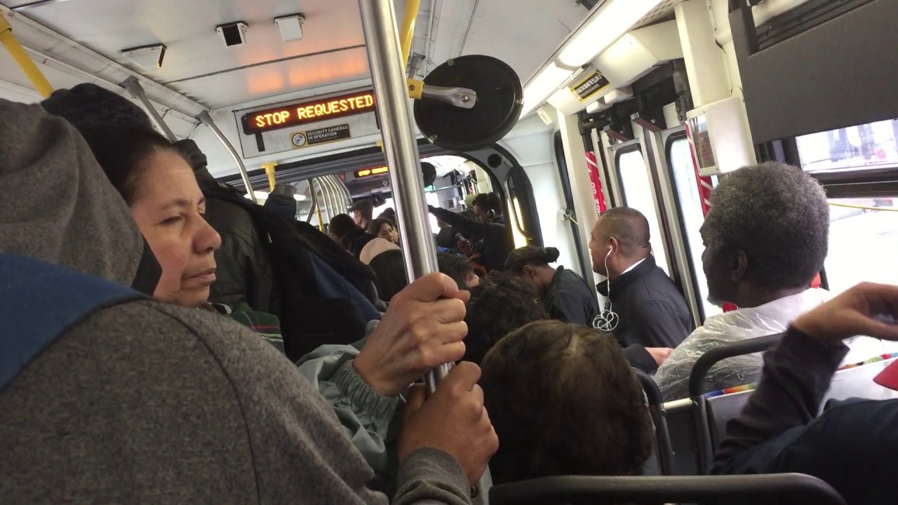 Crowded Metro Bus Ride during rain in Los Angeles