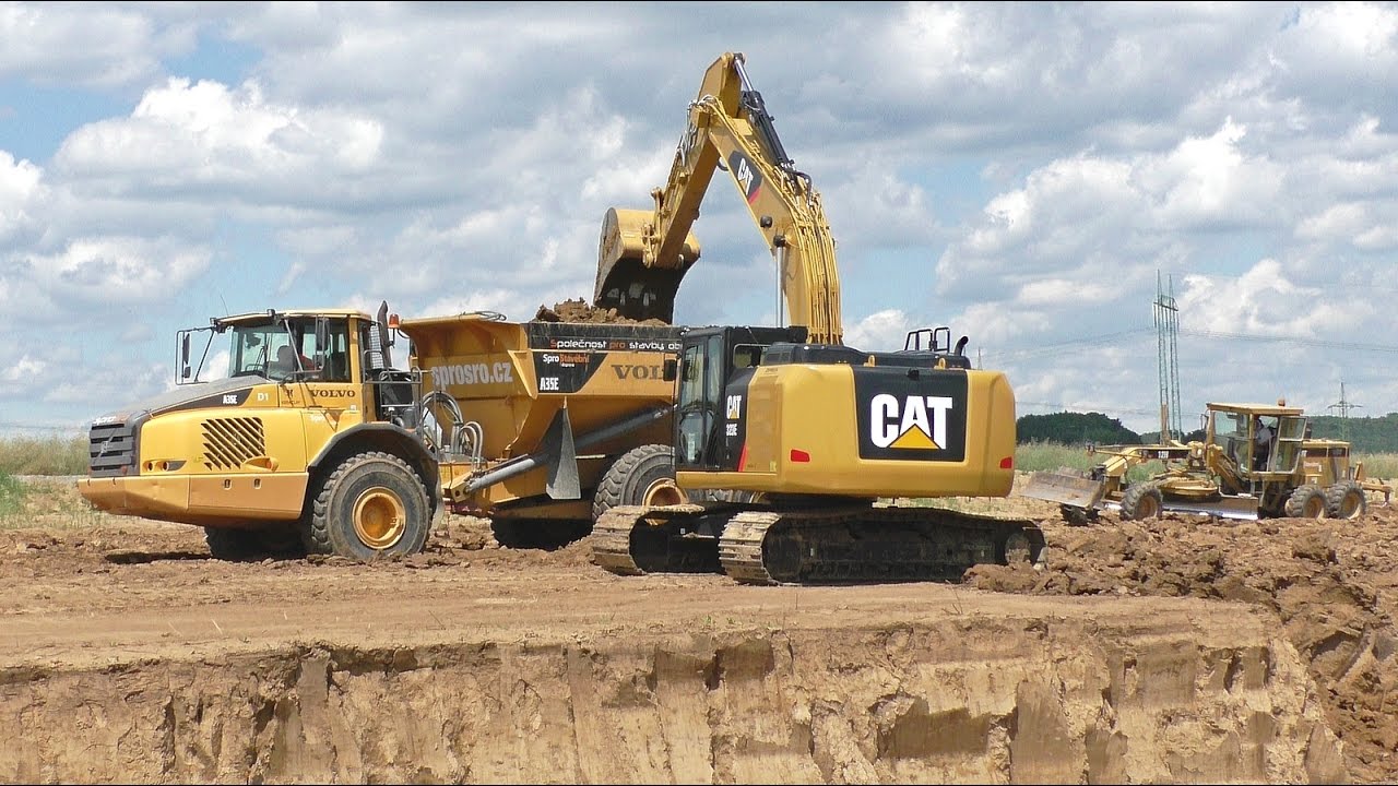 Cat 323E, Volvo A35E dumpers, Cat compactor and grader