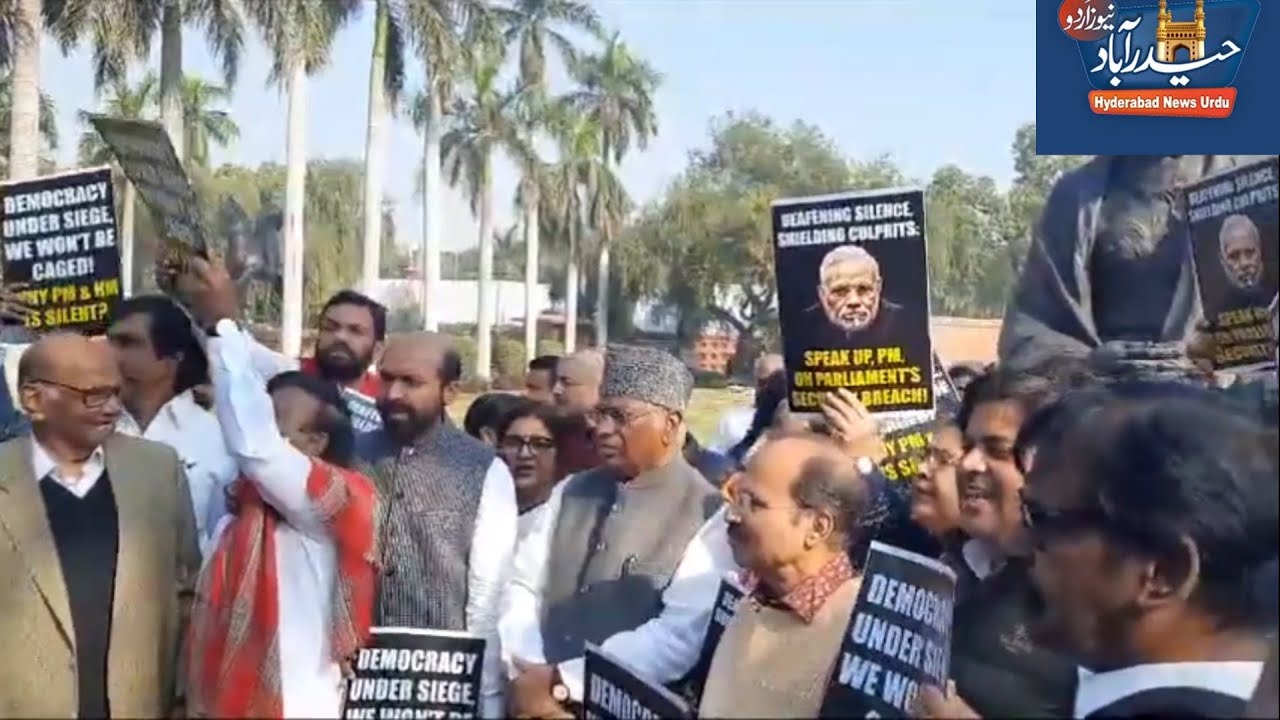 Opposition protests suspension of 92 MPs infront of Gandhi Statue in Parliament premises