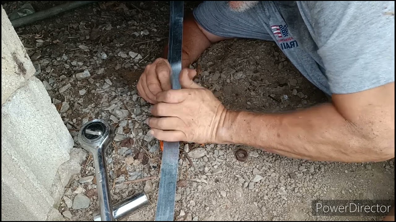 How - to replace a mobile home tie down strap !