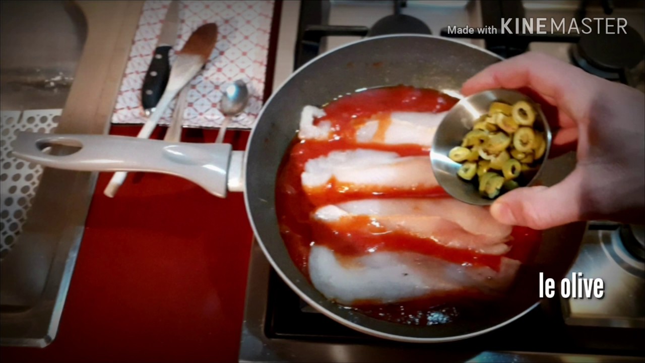 Filetti di Merluzzo surgelato con pomodoro ,origano e olive.