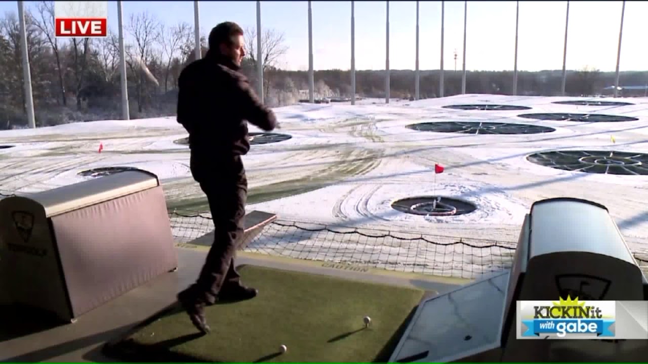 Fox 8`s Gabe Spiegel takes a swing at Topgolf Columbus