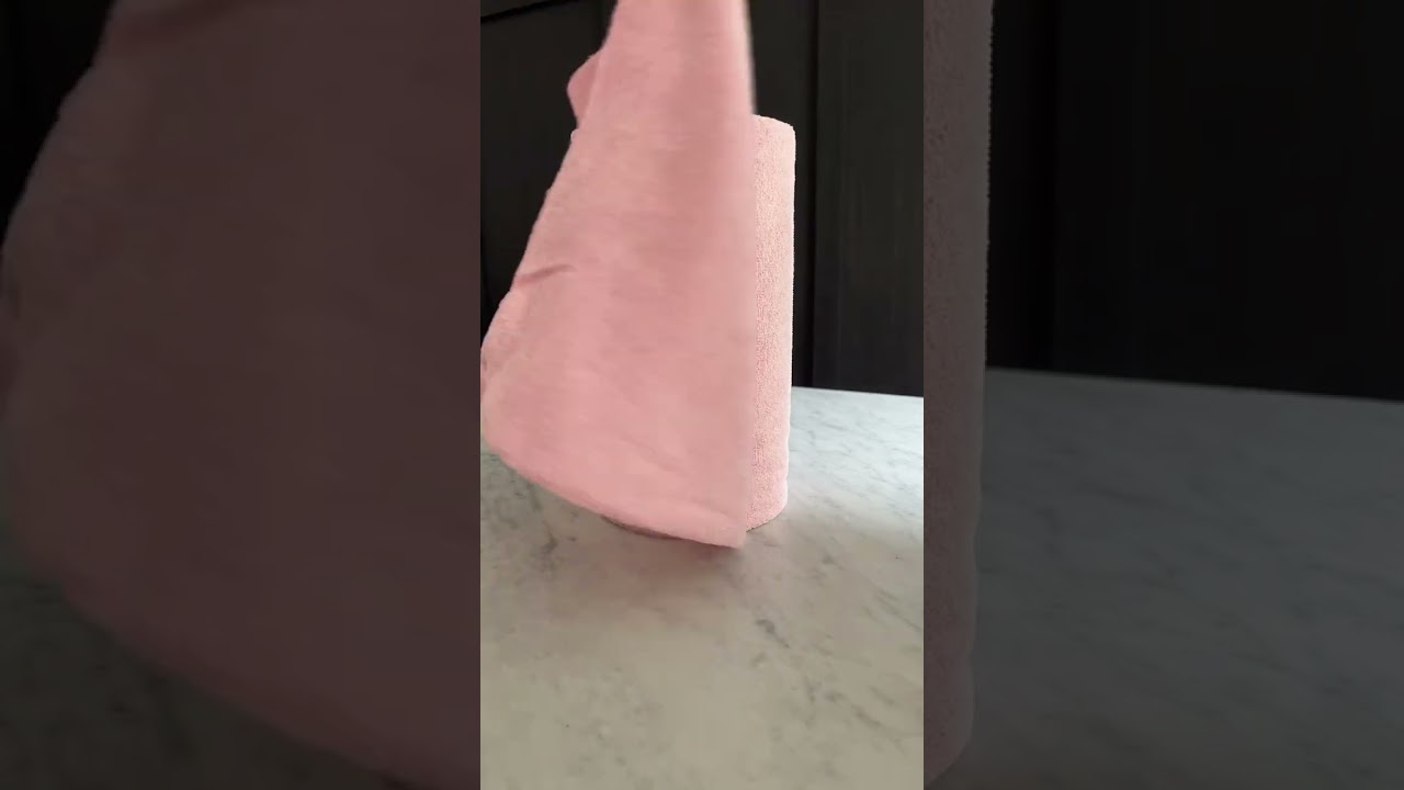 Cleaning hacks: paper towel holder with cleaning spray and microfiber towels