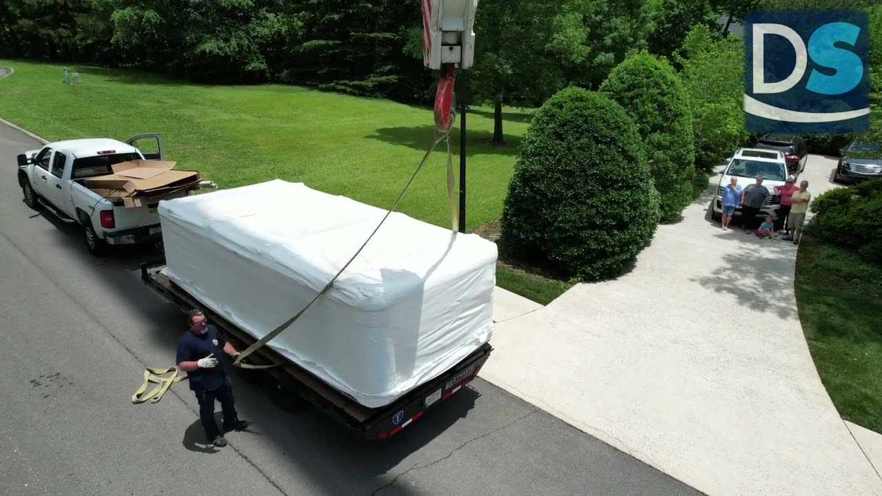 Lifting a heavy Swim Spa over a house *LARGE CRANE* *DRONE*