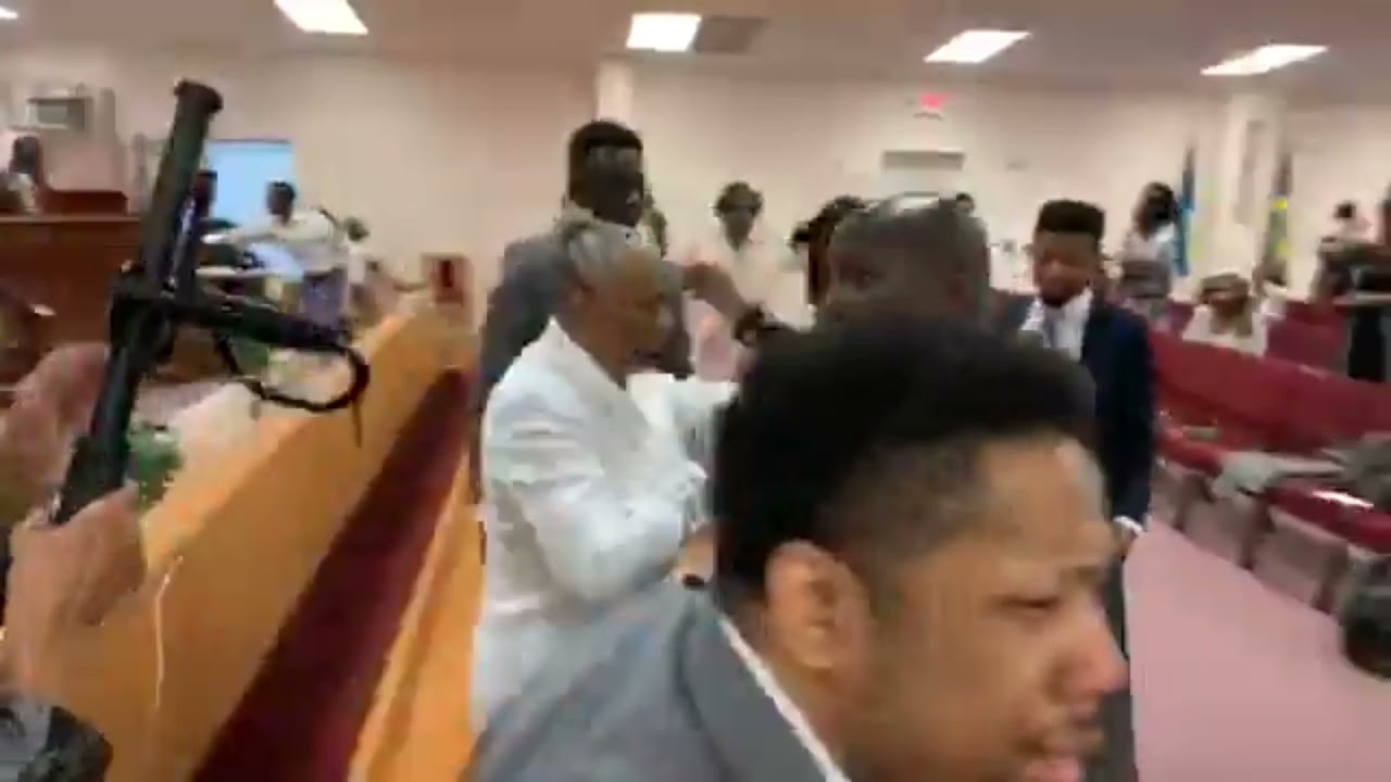 Dr. Gertrude Stacks and Sister Deborah Allen Laying Hands