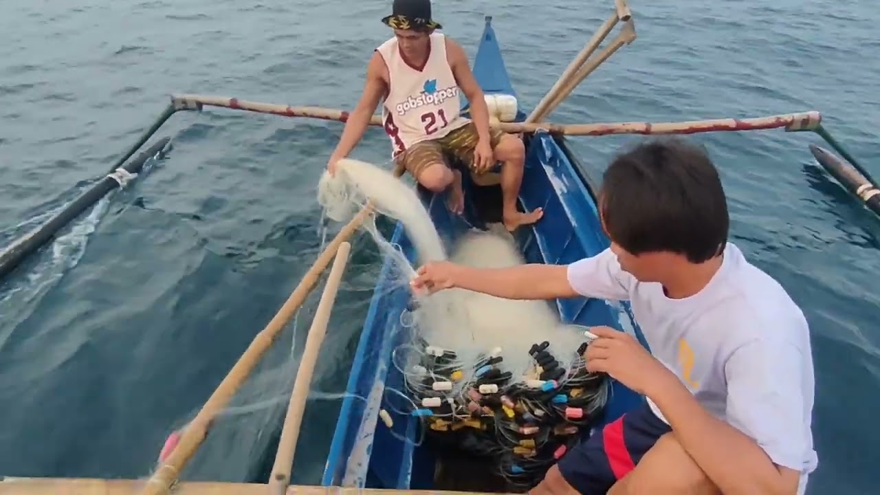 papanu mag-arya Ng lambat at papanu humuli Ng isda gamit Ang lambat
