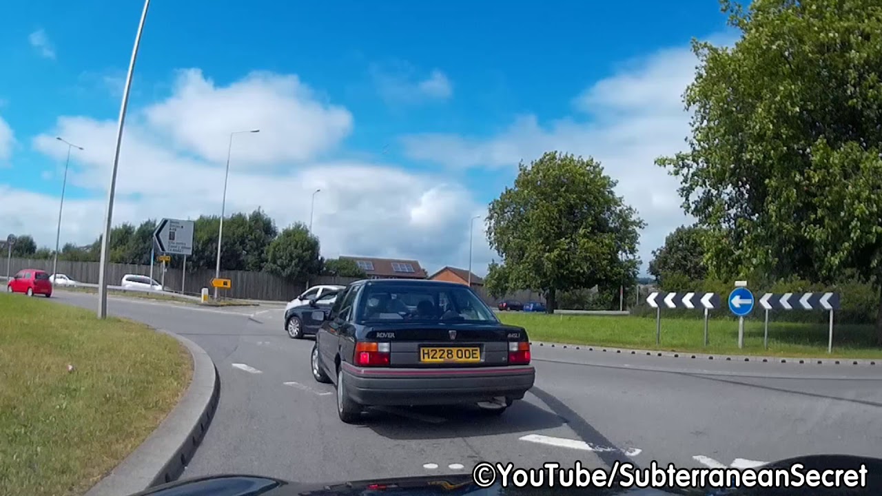 Old Age Pensioner Driving a Rover