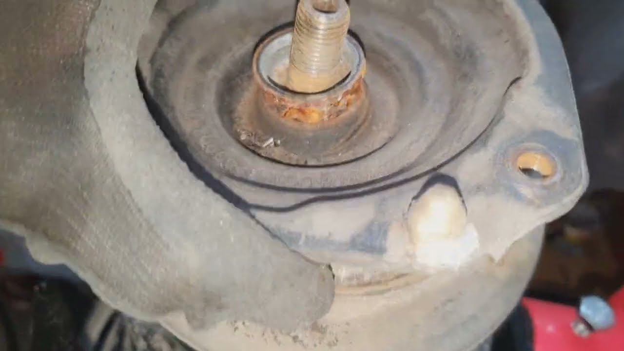 renault laguna front strut spring replacement