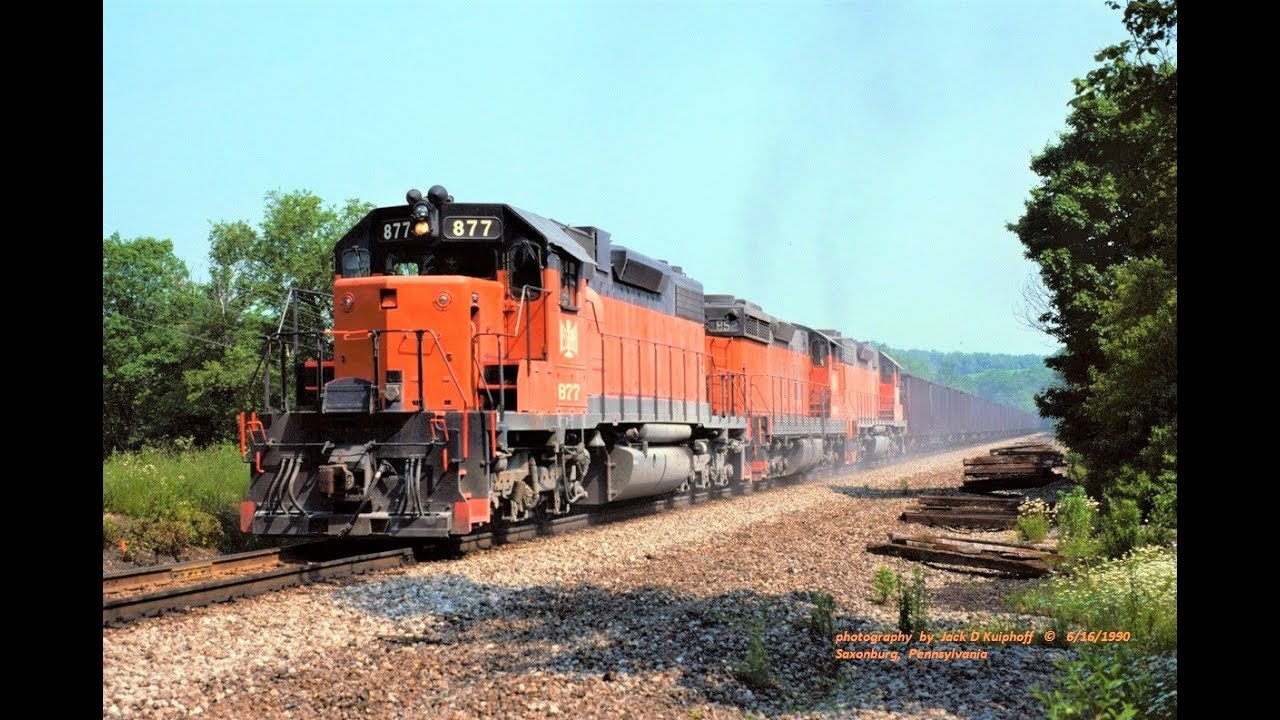 EMD SD38's & SD18 at a crawl in notch 8. Turn up your speakers on this one. 6/16/1990