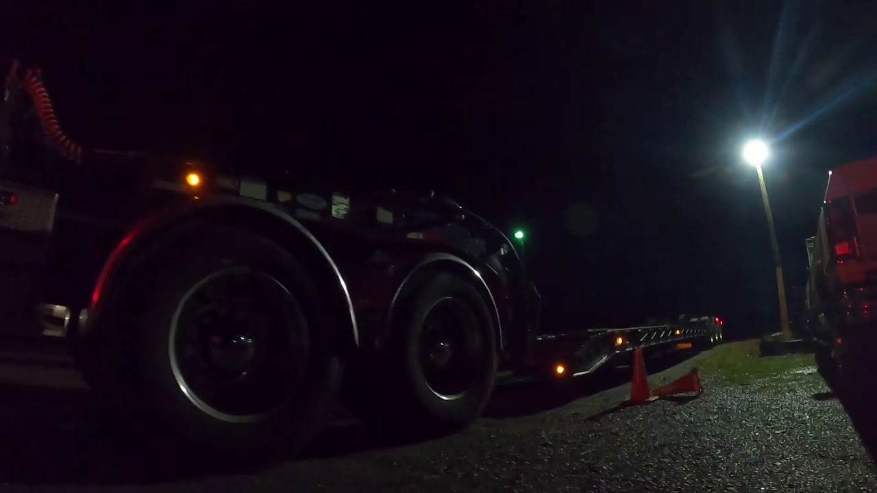 Peterbilt 389 Lowboy Hauling A Liebherr Dozer