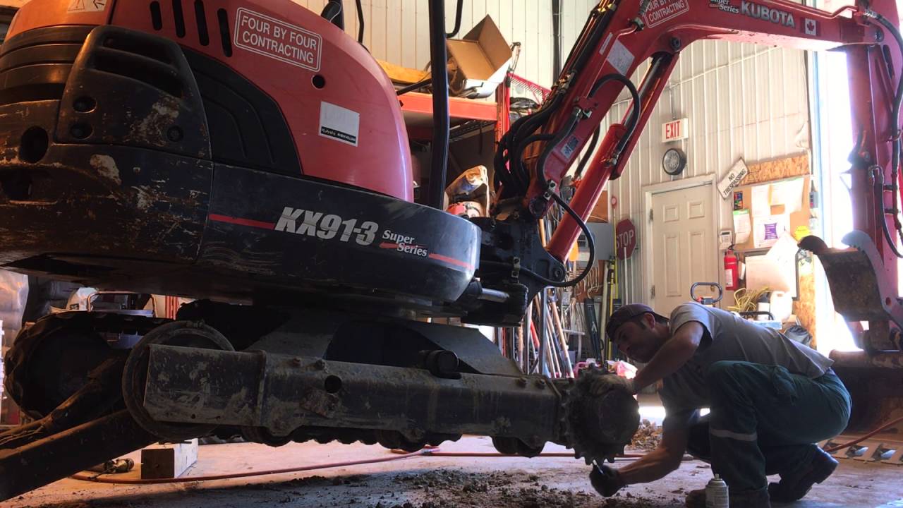 how to change rubber tracks on a kubota excavator