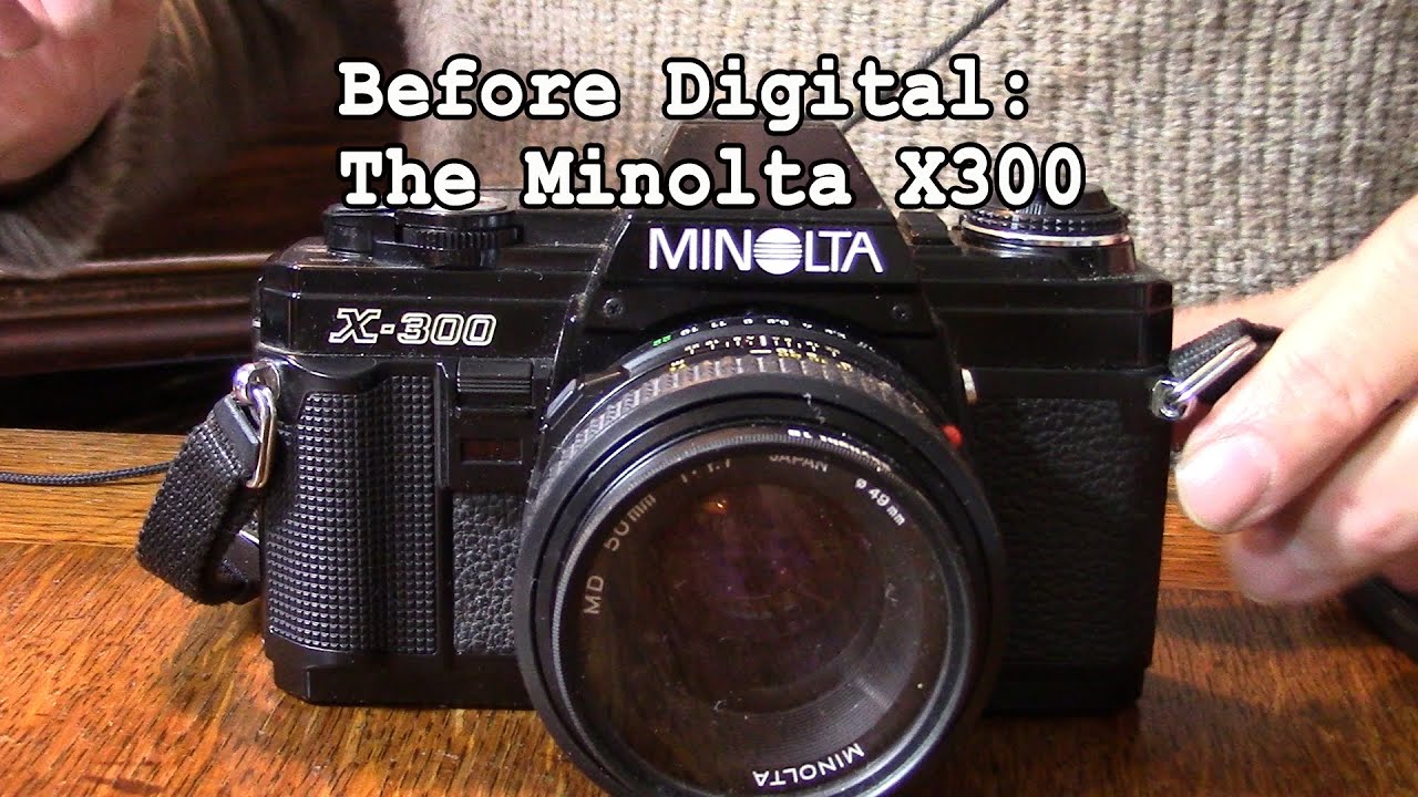 Минолта x300
