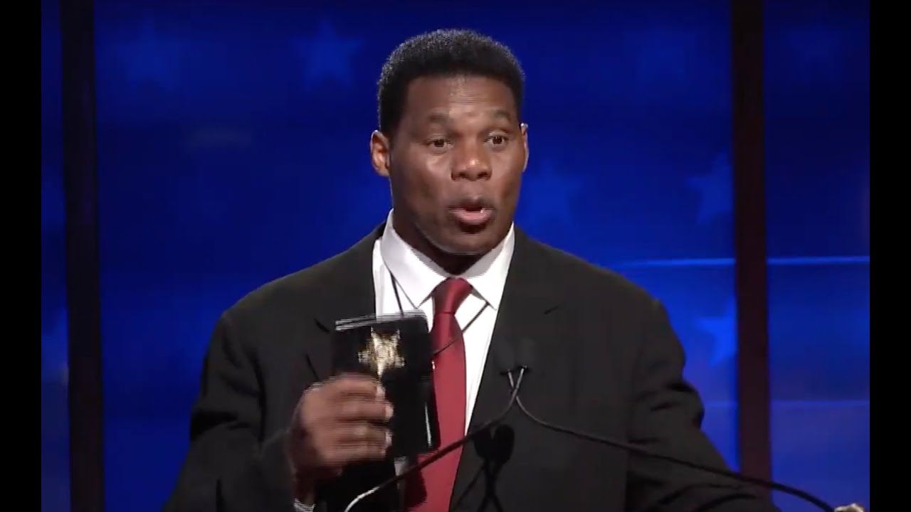 OMG: Herschel Walker pulls out fake police badge on stage, gets HUMILIATED by moderator