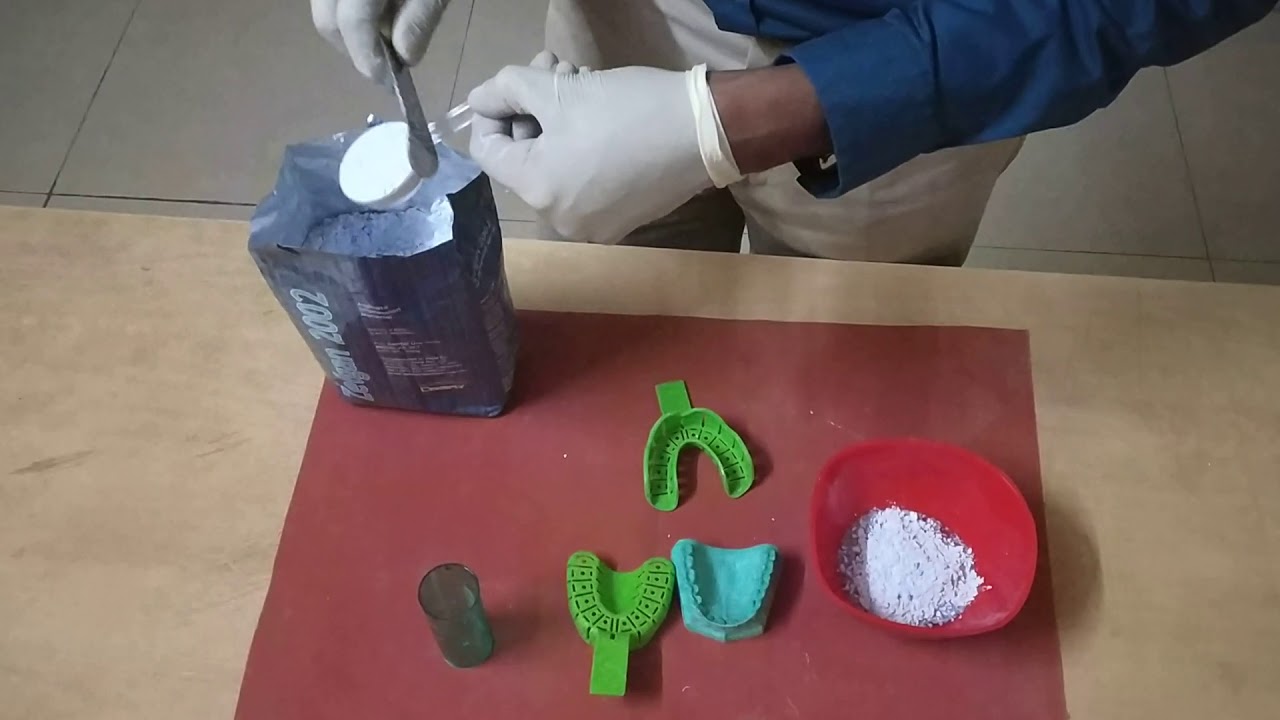Manipulation of Alginate impression material for making impressions of upper and lower jaws