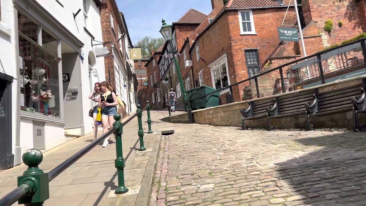 WALKING AT THE  FAMOUS STEEP HILL  IN LINCOLN ENGLAND