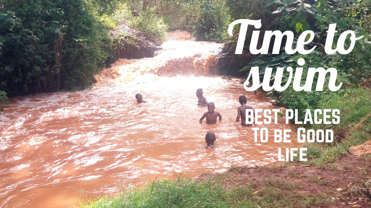 African boys swimming in the river//beautiful African life