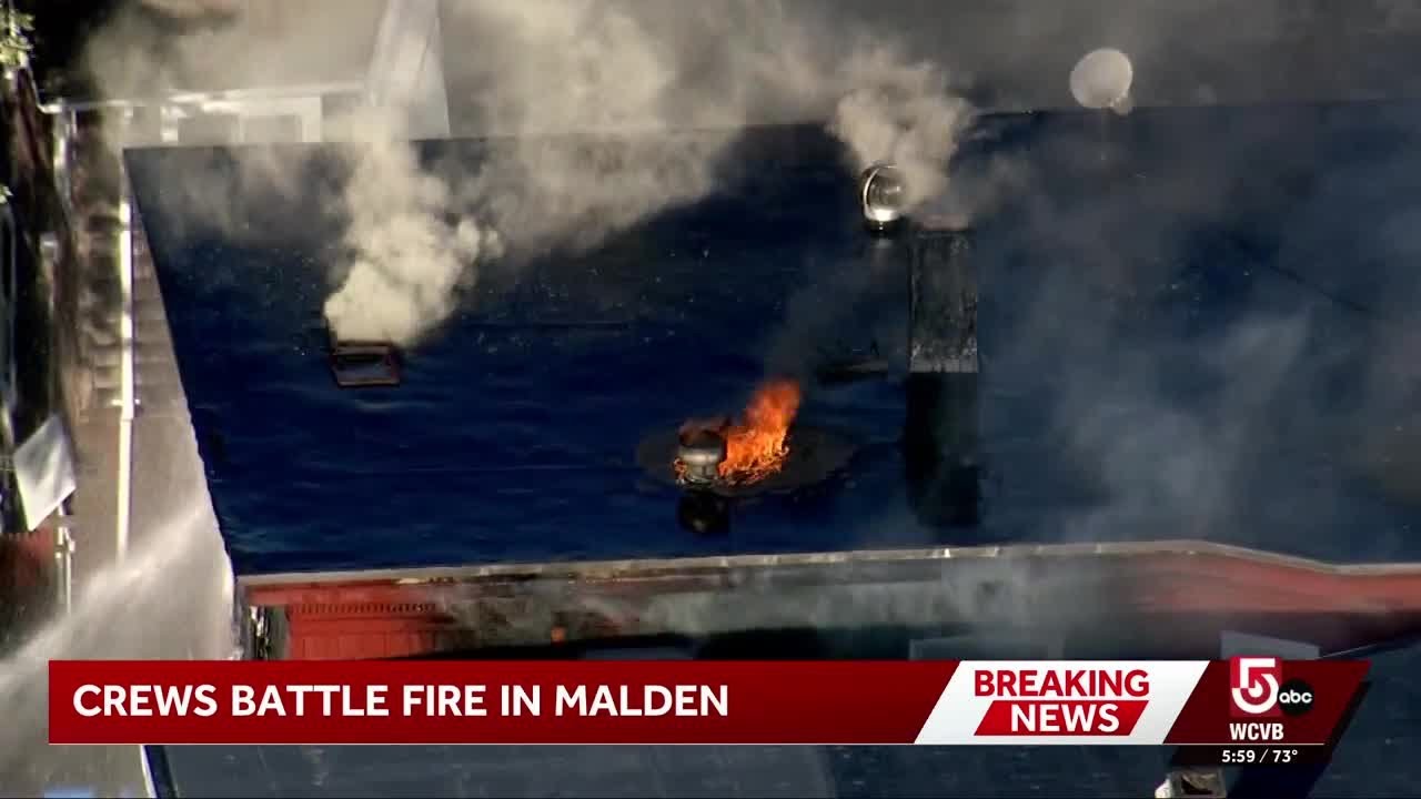 Large fire at Malden triple-decker under control