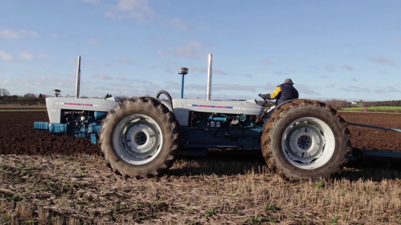 Ford Natco 130+ pulling 8 furrow plough