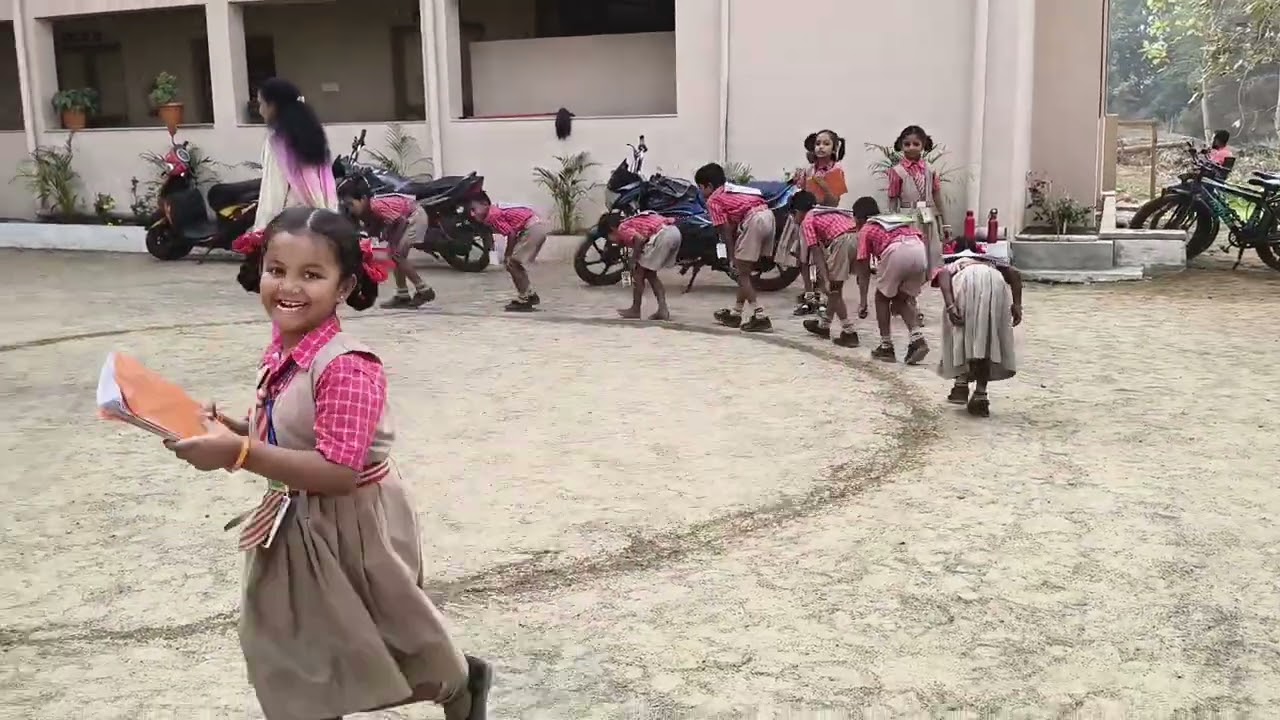 Book balancing game by 2nd class students...... Gulmohar English Medium School, Jami,VZM