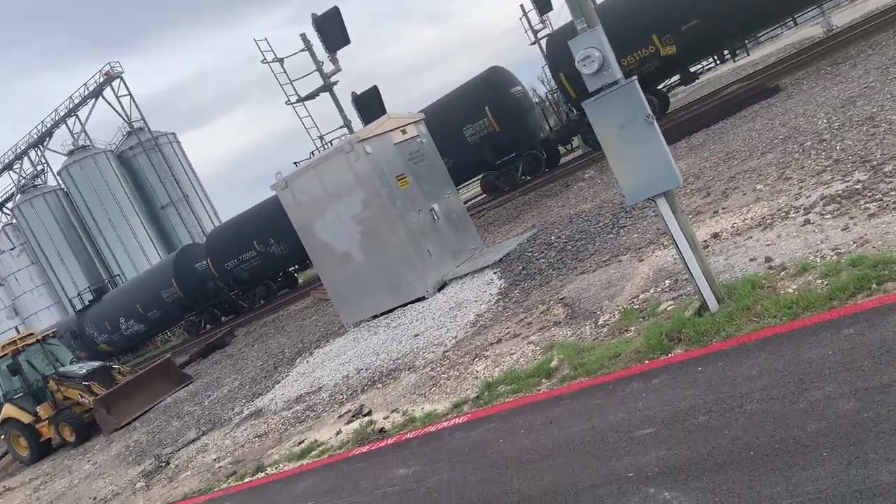 Southbound BNSF mix freight train ft FXE at Main Street in temple Texas on 3/16/26