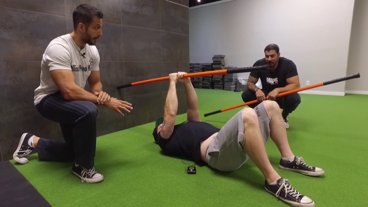 Stick Tension Hip Bridges to Wake Up Your Sleepy Butt