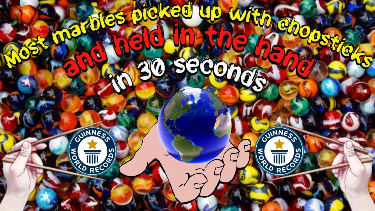 Most marbles picked up with chopsticks and held in the hand in 30 seconds