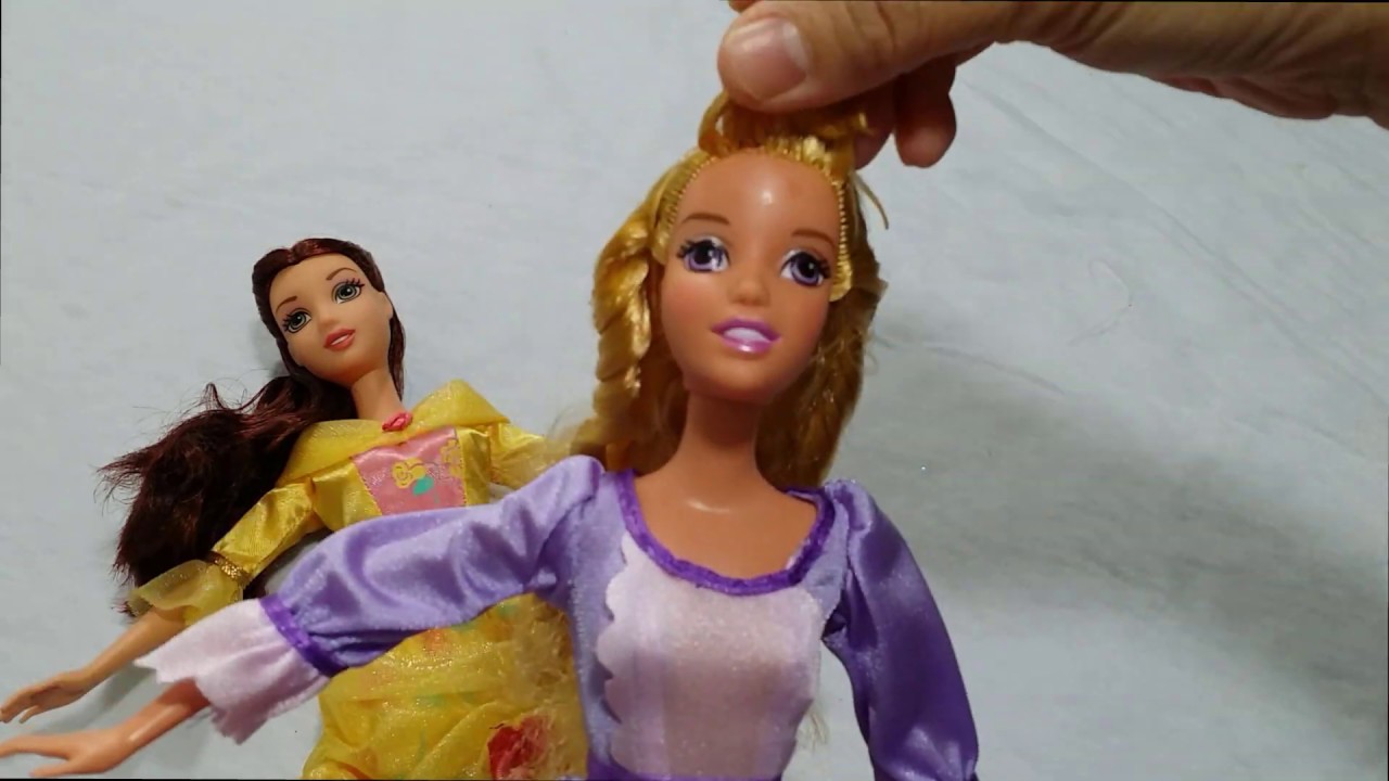 Old (1999) Disney's Belle and Rapunzel dolls by Mattel