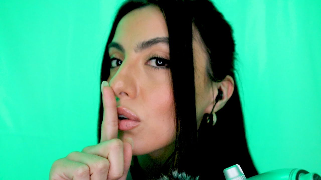 ASMR shushing sounds, personal attention, gentle hand movements, soft wind background noise