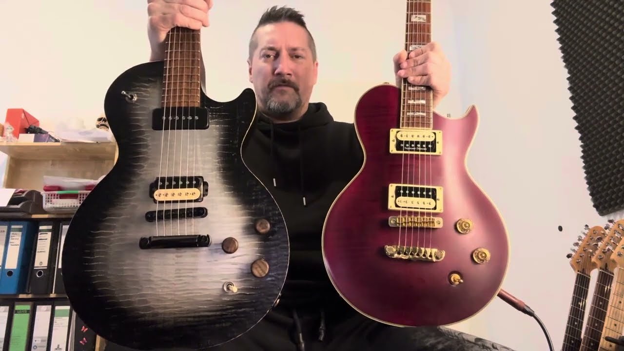 Comparison: Gibson Les Paul BFG Silverburst (08) vs. Aria Pro II Super Grade Series Wine Red (05) 