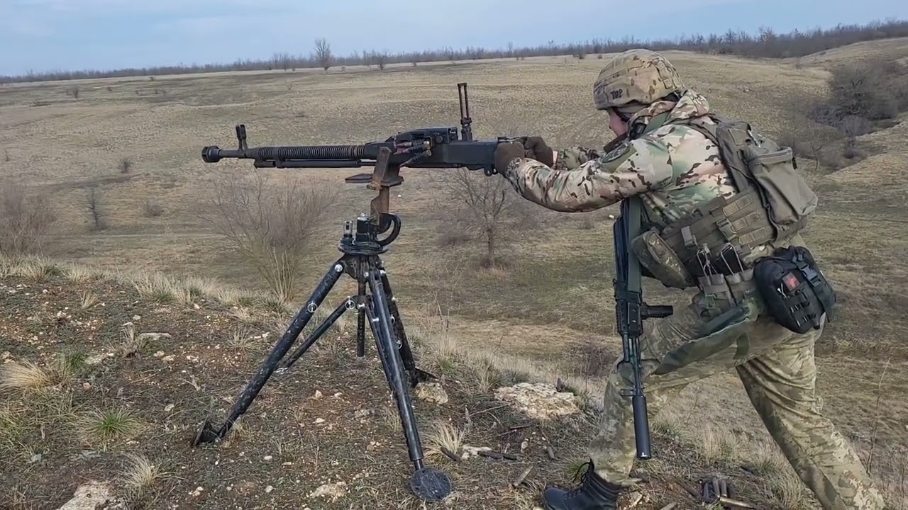 Ukraine - XX.03.2024. A Ukrainian Soldier With The Tripod-Mounted DShK Heavy Machine Gun.