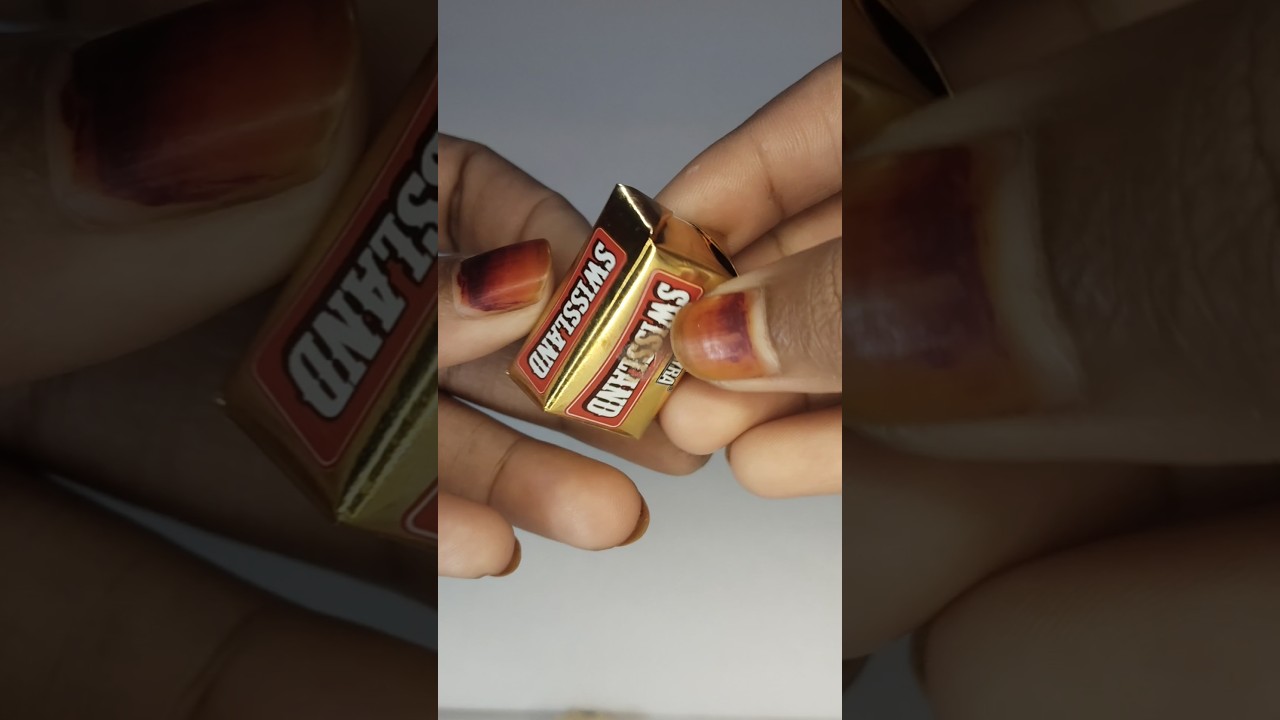 Unwrapping candy bar 🍬🍬.  