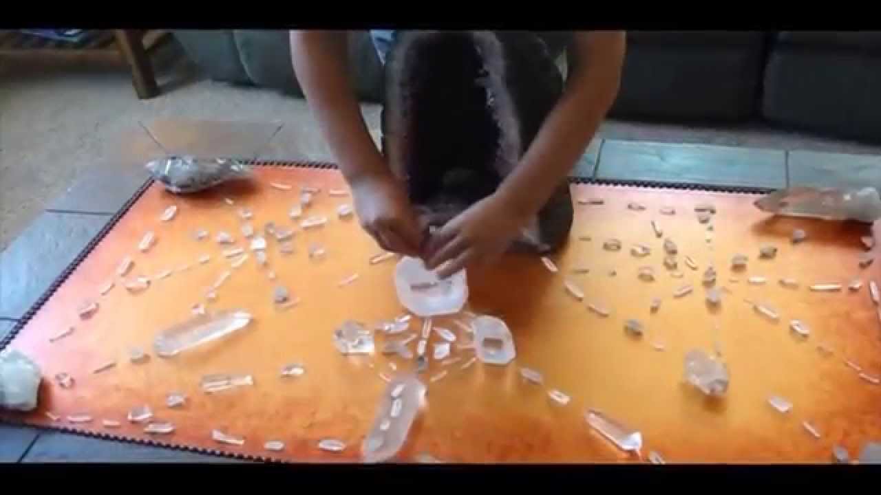 8 year old kid builds crystal grids to clear negative energy and explains how it works
