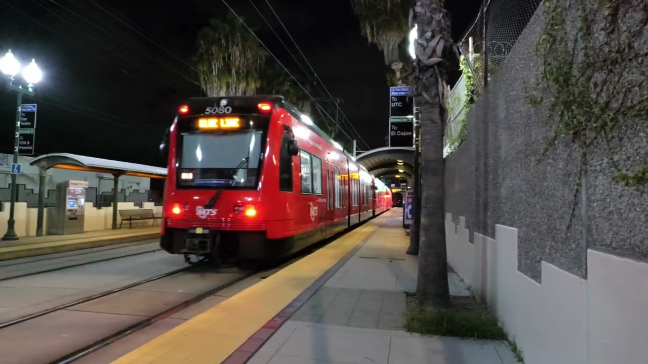 Pacific Surfliner and Coaster Trains Passing San Diego Trolley and Sprinter Stations