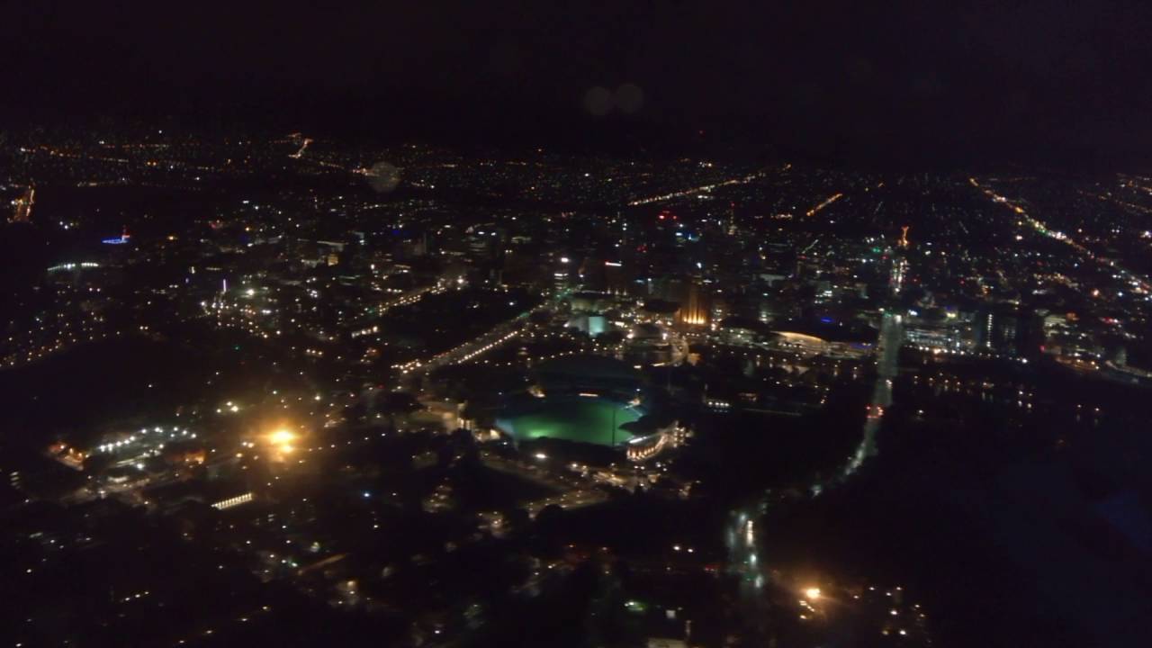 Landing into Adelaide Airport (ADL) at night, approach over CBD