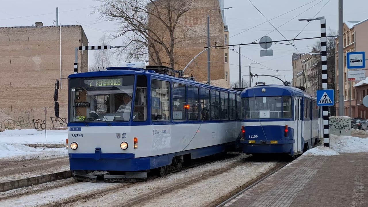 Tatra T3A- 31096 + 31106 meets with Tatra T3MR- 35294 + 35304 on the stop Daugavpils iela