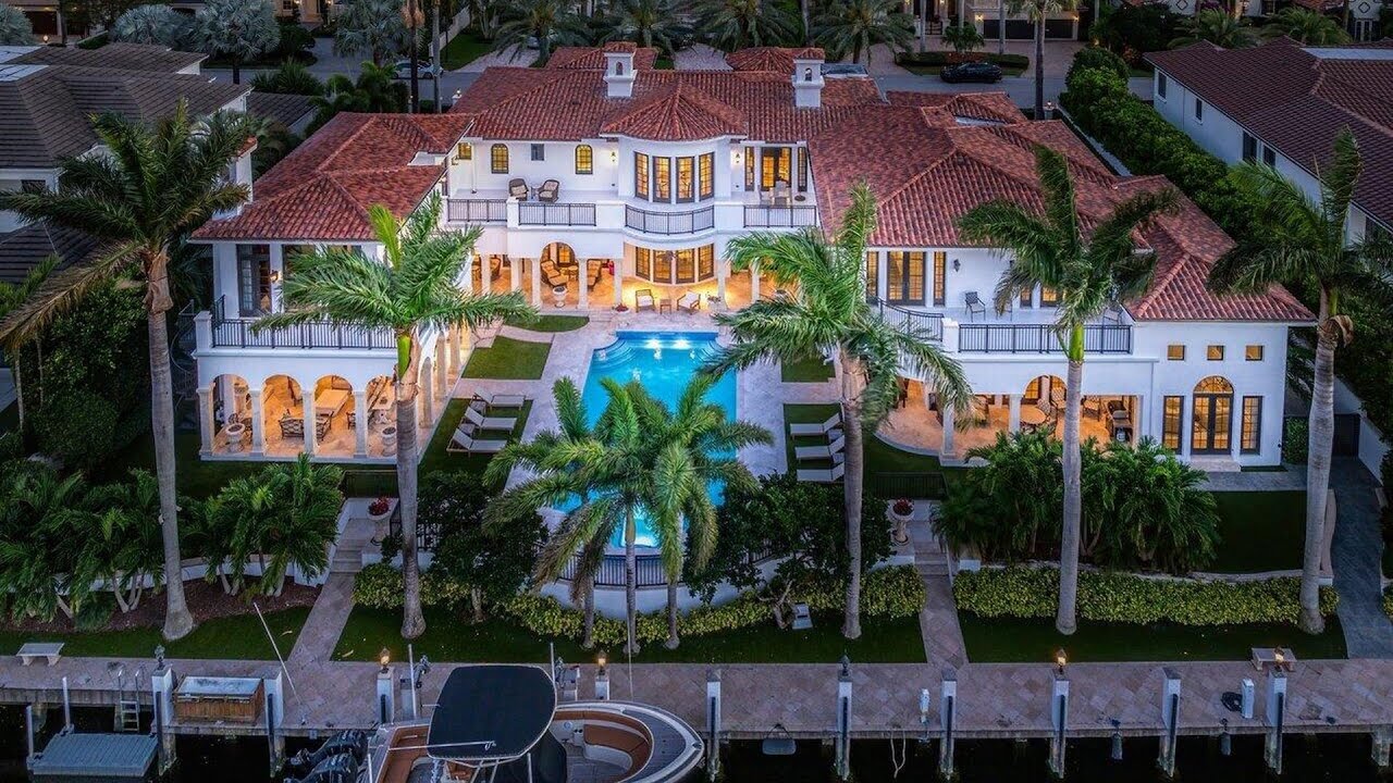 For $19,750,000! Elegant transitional mansion with 2 elevators in Boca Raton