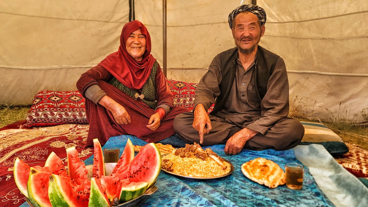 Talented Old Couple Cooking Traditional Meat & Rice Feast