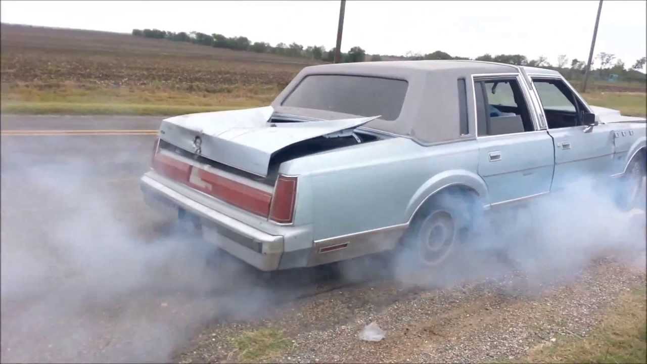 LINCOLN TOWN CAR ABUSE! BURNOUT WITH NO TIRES