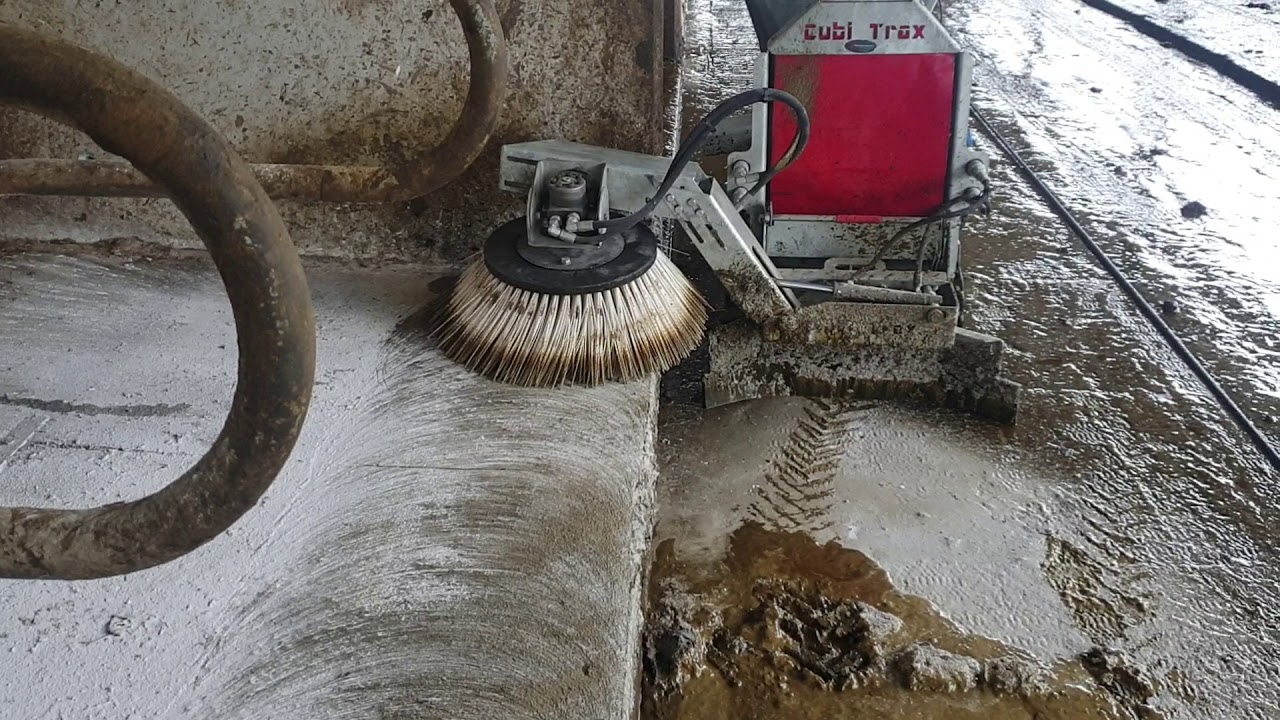Rubber tracked pedestrian  cubicle cleaner