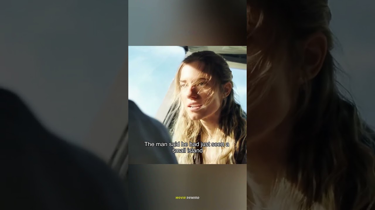 The woman was lying on the wing of the plane.