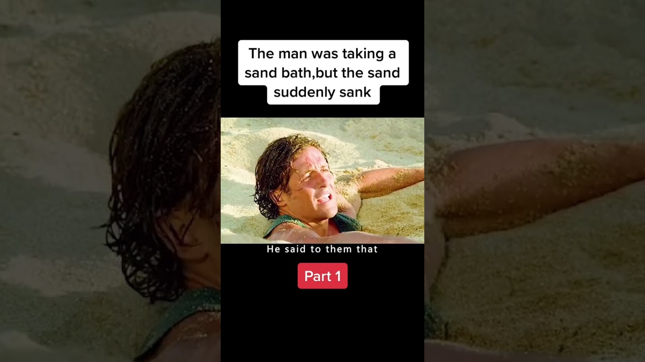 Man stuck in sand, unable to move!