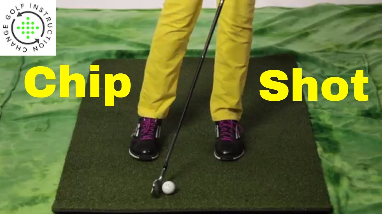 Playing a low chip shot around the green