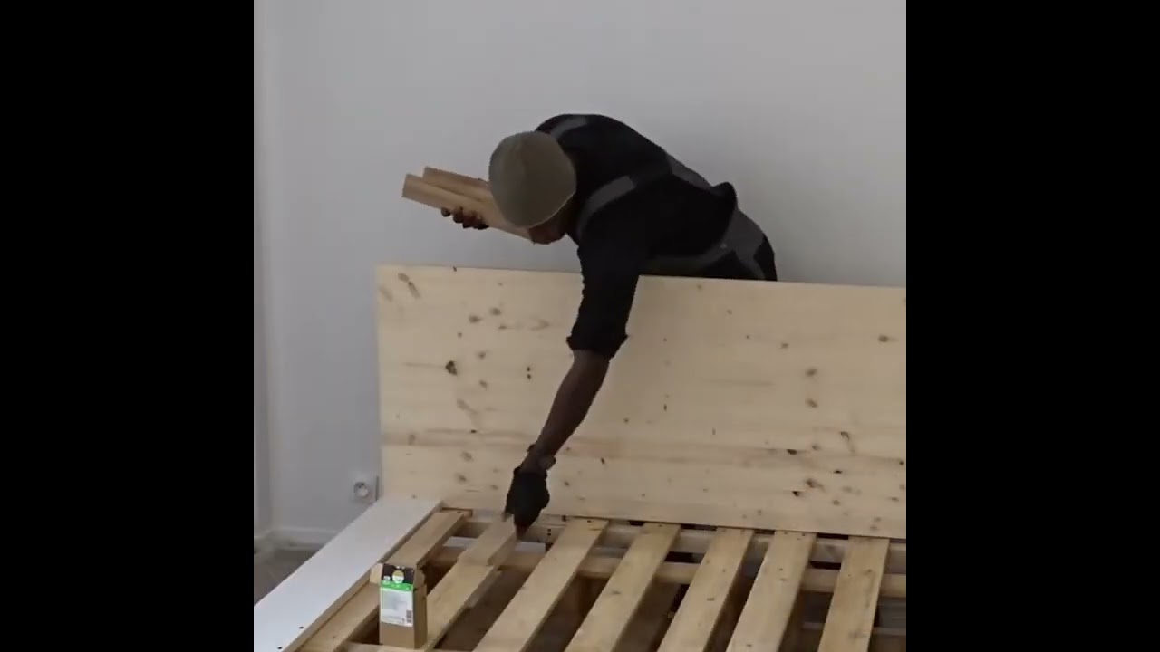 Un lit en bois de palette à Paris: incroyable