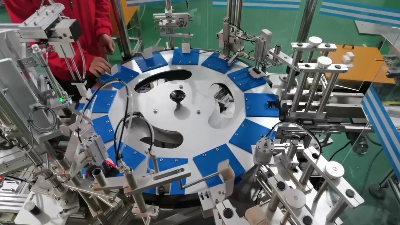 Vertical cartoning machine integrated with sticker labeling and counterfeit labeler