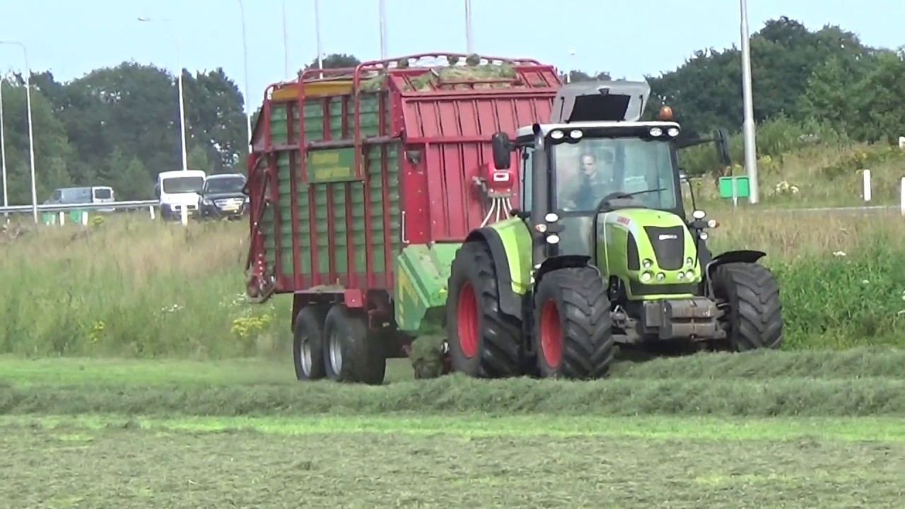 CLAAS ARION 640 MET EEN STRAUTMANN SUPER VITESSE CFS 3501GRAS INKUILEN 2017