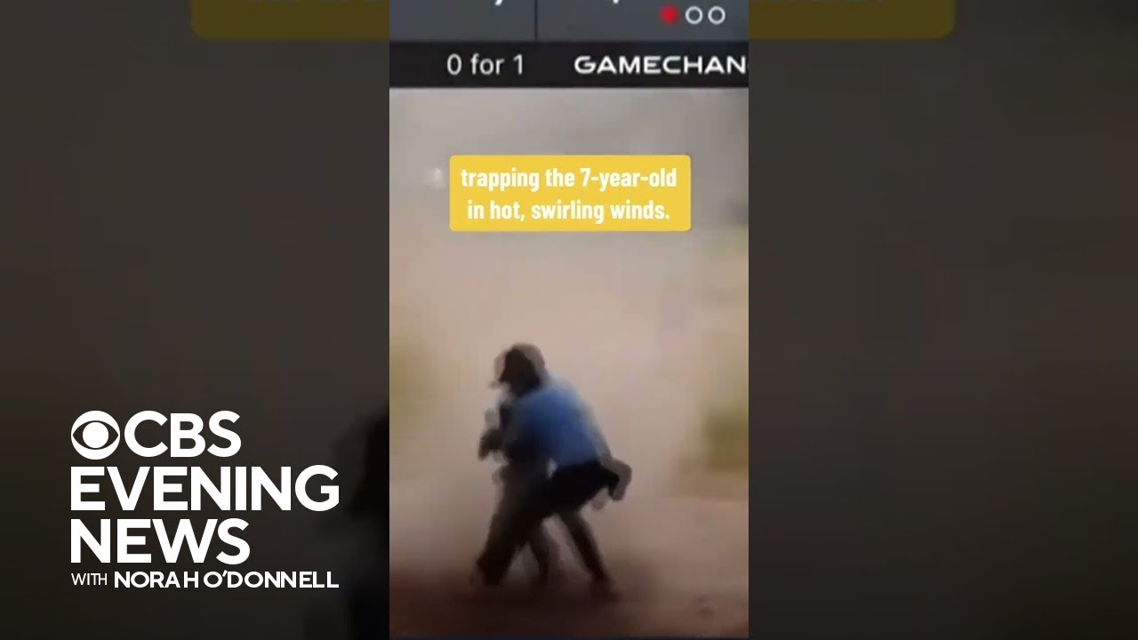 Teen umpire rescues 7-year-old from dust devil during Little League game #shorts