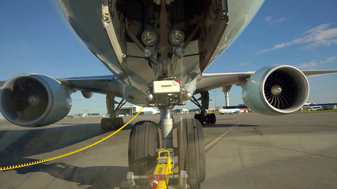 Boeing 777-200LR Push-back and Engine Start. YYC