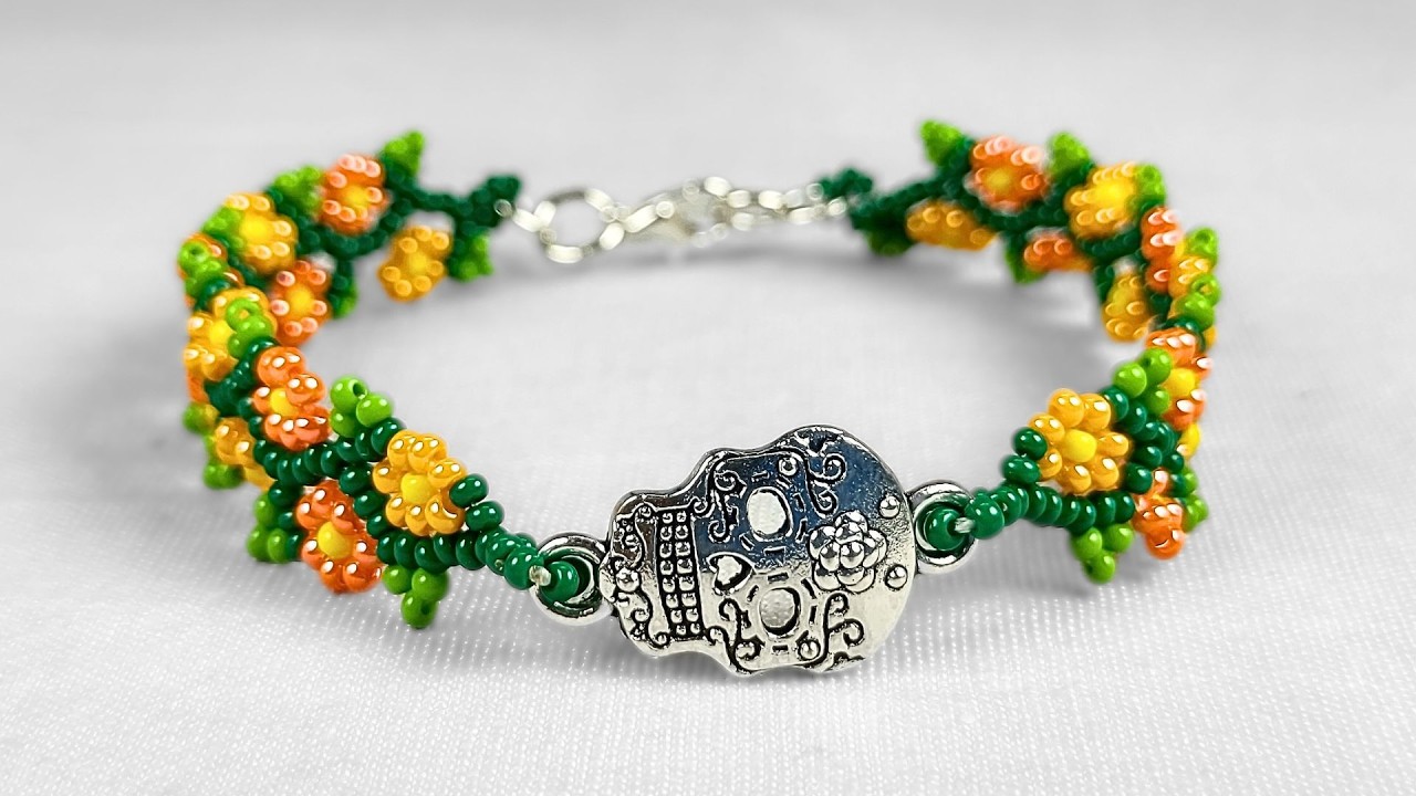 💀🌼🌿Cómo hacer una pulsera de con dije central de calaverita y cadeneta floral con chaquiras 💀🌼🌿